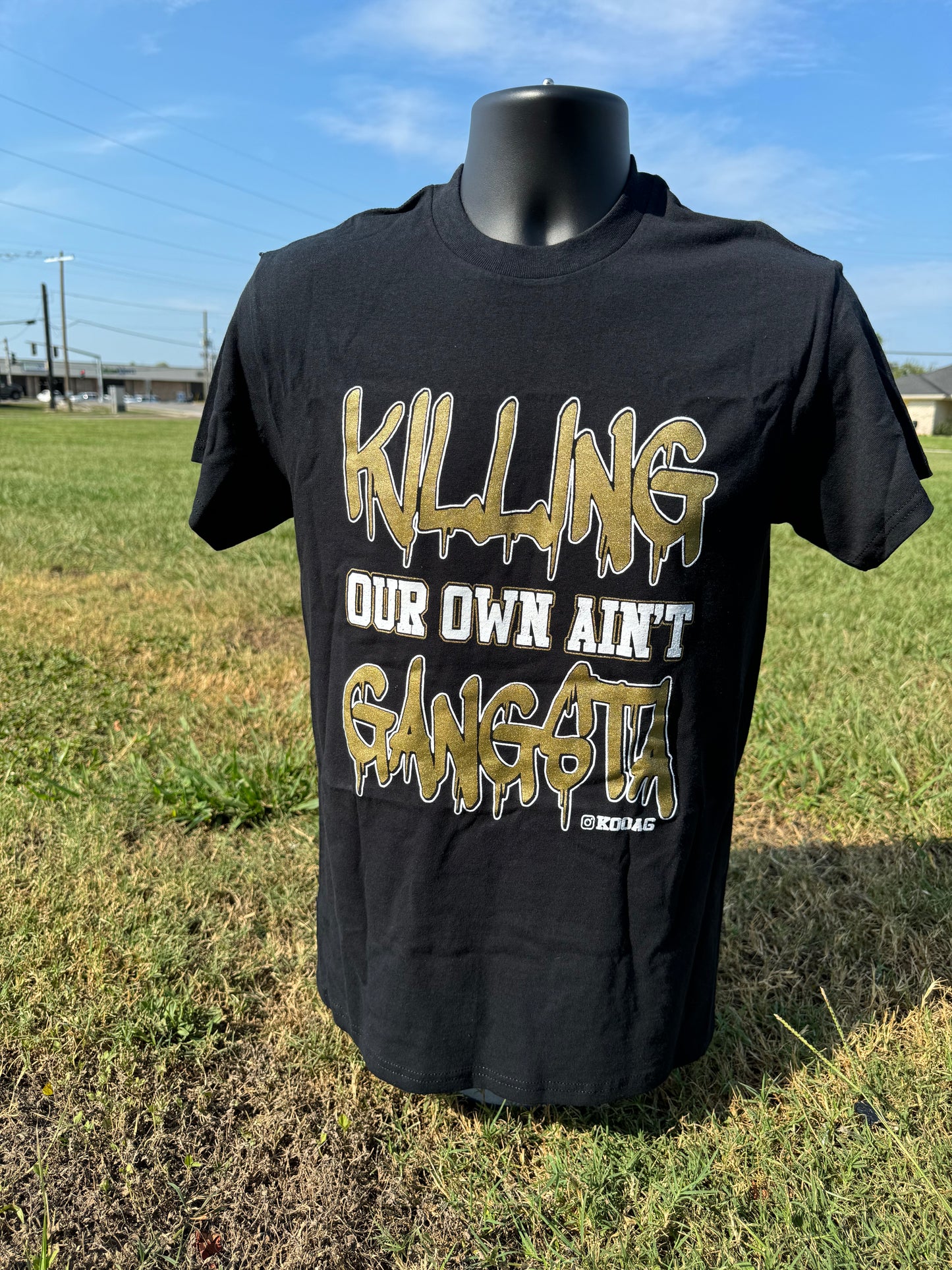 Black Shirt Gold Letters